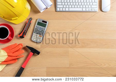 Office Desk With Computer, Cup Of Coffee And Engineer Equipment.top View With Copy Space. Background