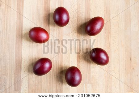 Red Colorful Easter Eggs On Wooden Background