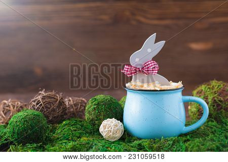 Wooden Polka Dot Grey Rabbit In A Blue Cup On The Grass Background, Easter Postcard Concept, Toned