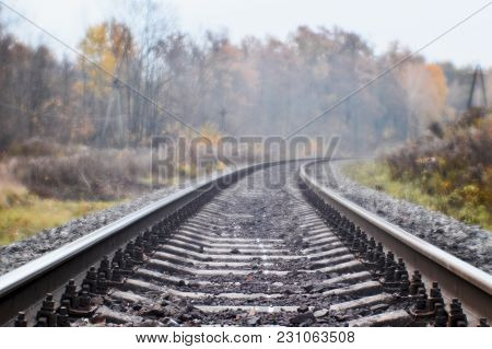 Soft Blur Photos Taken On The Soft Lens. Railroad In Autumn Stretches Into The Distance