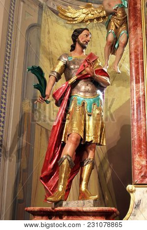 OZALJ, CROATIA - JULY 02: Saint Modestus Apostle of Carantania, statue on the main altar in Saints Vitus church in Ozalj, Croatia on July 02, 2016.