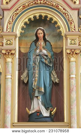 SISAK, CROATIA - DECEMBER 07: Statue of Our Lady in the Church of Holy Cross in Sisak, Croatia, on December 07, 2017.