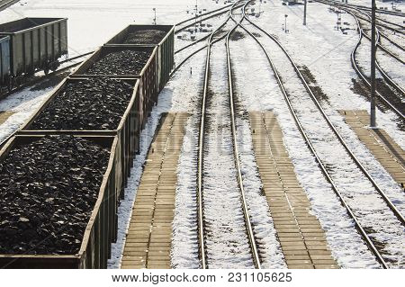 Rail Cars Loaded With Coal, A Train Transports Coal.