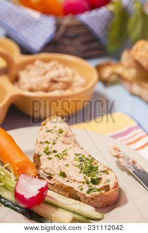 Open Sandwich With Roasted Bread Ciabatta And Herring Cream Cheese. Fresh Vegetables On The Dish. Cl