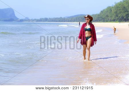 Women Shape Pretty And Bikini Daylight On Beach At Bang Beot Beach, Chumphon Province Thailand