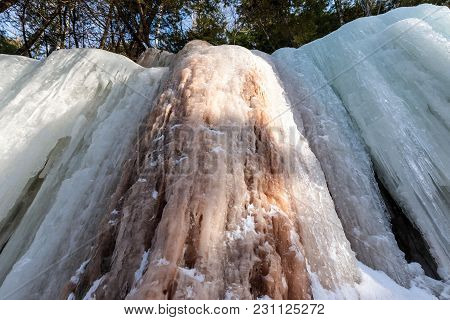 Ice Caves And Ice Curtains Form Along The Pictured Rocks Escarpment On Sand Point Road In Munising M