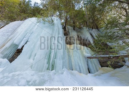 Ice Caves And Ice Curtains Form Along The Pictured Rocks Escarpment On Sand Point Road In Munising M