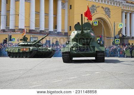 Saint Petersburg, Russia - May 09, 2018: Soviet And Russian Tanks T-34-85 And T72b3 On The Military 
