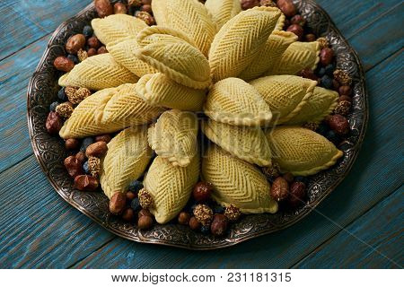Traditional Azerbaijan Pastries Shekerbura For Novruz Spring Equinox Celebration On Tray On Wooden T