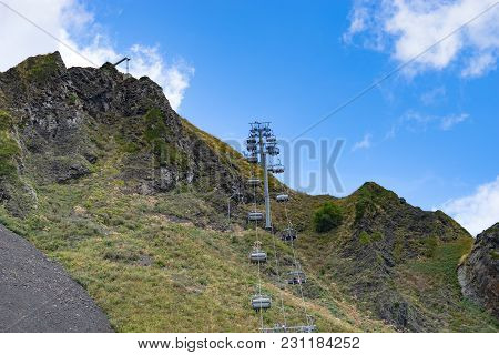 Sochi, Russia-september 30, 2017: Mountain Landscape With Rocky Slopes And The Cable Car In Krasnaya