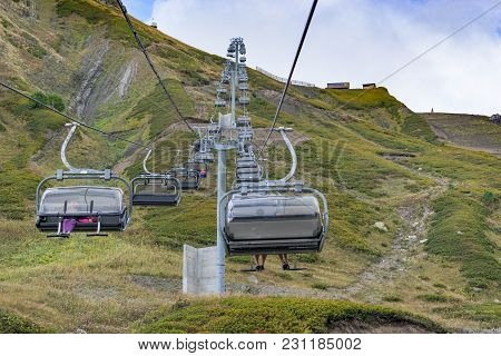 Sochi, Russia-september 30, 2017: Mountain Landscape With Rocky Slopes And The Cable Car In Krasnaya