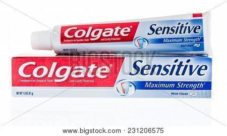 Winneconne, Wi - 9 March 2018: A Package Of Colgate Sensitve Tooth Paste On An Isolated Background.