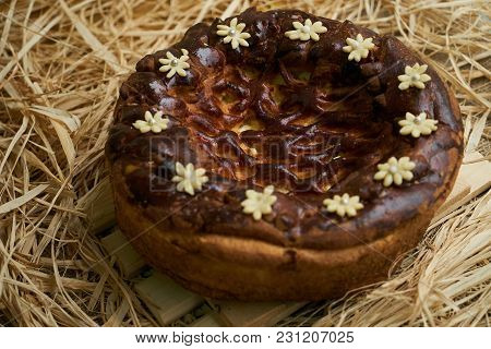 Traditional Ukrainian Wedding Bread Korovai Or Karavai With Decorations On Rustic Straw Background.