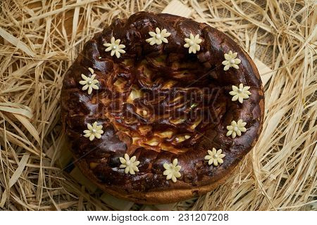 Traditional Ukrainian Wedding Bread Korovai Or Karavai With Decorations On Rustic Straw Background.