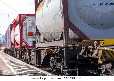 Fuerth / Germany - March 11, 2018: A European Freight Train Passes Train Station Fuerth In Germany