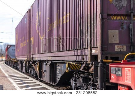 Fuerth / Germany - March 11, 2018: A European Freight Train Passes Train Station Fuerth In Germany