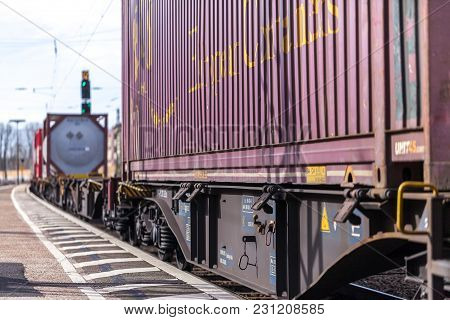 Fuerth / Germany - March 11, 2018: A European Freight Train Passes Train Station Fuerth In Germany