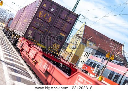 Fuerth / Germany - March 11, 2018: A European Freight Train Passes Train Station Fuerth In Germany