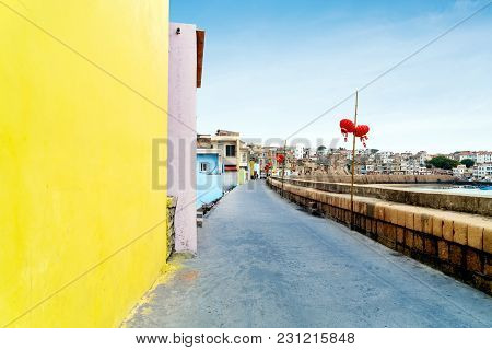 Dongshan Island Coastline And Town Buildings, Fujian, China