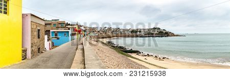 Dongshan Island Coastline And Town Buildings, Fujian, China
