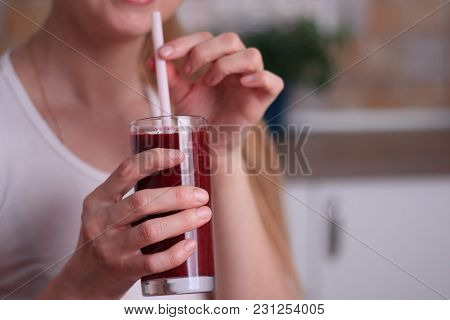 Girl Is Drinking Fresh Healthy Beet Smoothie