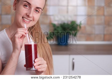 Girl Is Drinking Fresh Healthy Beet Smoothie