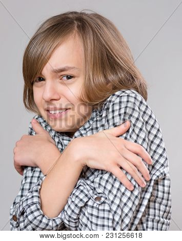 Girl Feel Cold - Close-up Portrait Of Frozen Girl On Gray Background. Young Child Freezing. Pretty F