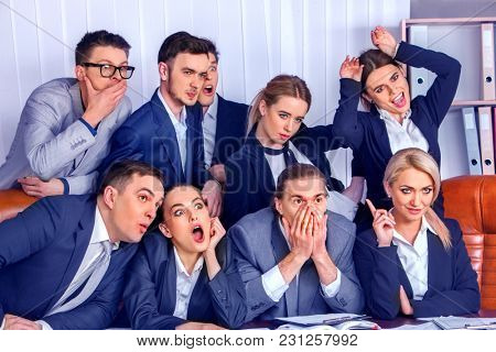 Business people office. Team people are unhappy with their leader. Intern man manager does not cope with his duties. Crowd in stress throw up their chief's papers. Employees scoff at boss.
