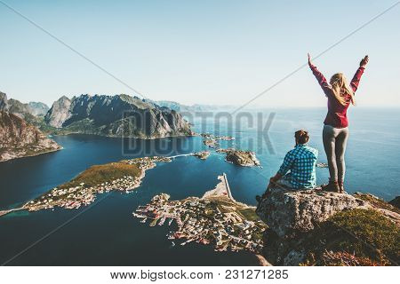 Couple Family Traveling Together On Cliff Edge In Norway Man And Woman Lifestyle Concept Summer Vaca