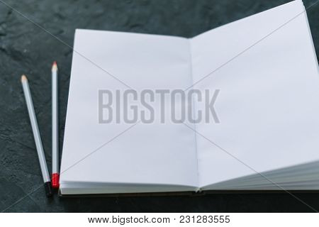 Notepad With Pencils Mocap. Place For Text.