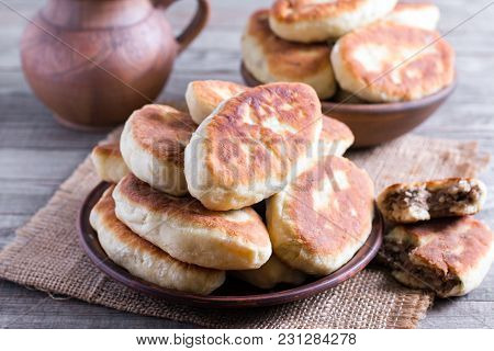 Fried Patties With The Meat In The Plate On Old Wooden Background