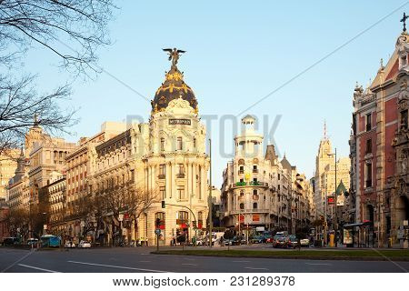 Madrid, Spain - April 5, 2010: Gran Via And The Iconic Metropolis Building Sourrounded By Trational 