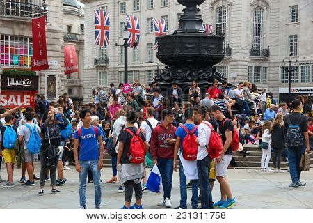 London, Uk - July 9, 2016: People Visit Piccadilly Circus In London. London Is The Most Populous Cit