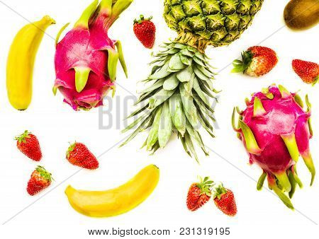 Tropical Fruit Background. Bananas, Strawberries, Pineapple, Kiwi And Dragonfruit Isolated On White 