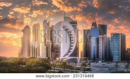 Doha, Qatar - December 17, 2017: The Skyline Of West Bay Of Doha City During Sunset. View From Shera