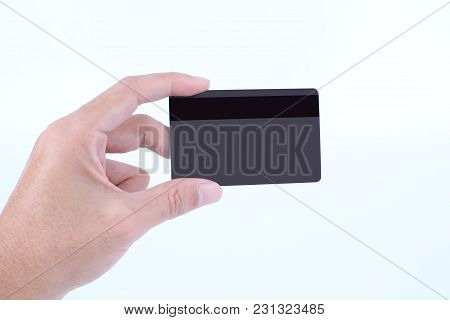 Man Hand Holding Credit Card Or Debit Card Isolated On White Background
