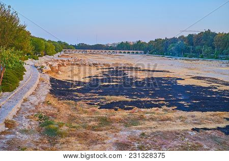 The Landscape Of Isfahan With Dried-up Zayandeh River, Park Zone On Its Banks And Medieval Joui Brid