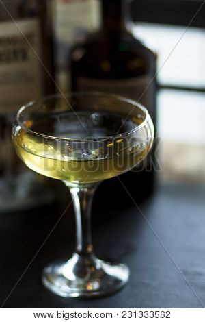Transparent Cocktail In A Beautiful Chalet On A Wooden Table
