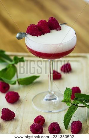 Berry, Bright, Summer Cocktail With Raspberries On The Table