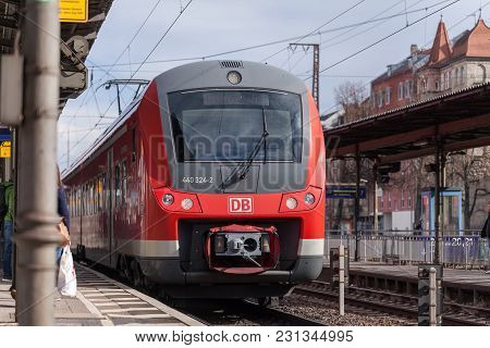 Fuerth / Germany - March 11, 2018: Re Regional Express Train From Deutsche Bahn Passes Train Station