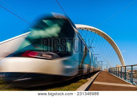 Tram Movement On The Citadelle Bridge Across Bassin Vauban For Trams And Bicycles