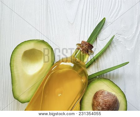 Avocado Oil On White Wooden Background Avocado Oil, Manicure, Ripe, Ingredient, Nutritious, Half