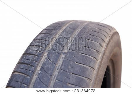 Worn Out Car Tire Tread / Danger Of Using Old Car Tire With Low Tread Depth Concept