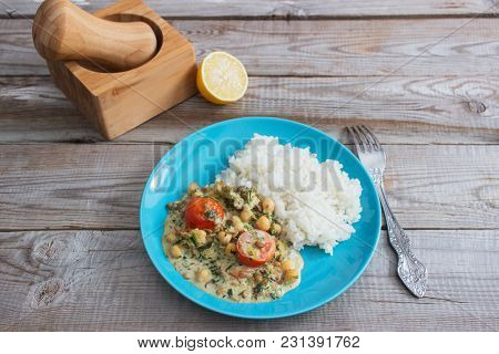 Coconut Milk Indian Dish Dal Wooden Background.