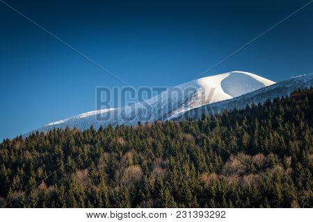 Mountain Landscape In Winter Season, The Stoh Hill In The Vratna Valley At The National Park Mala Fa