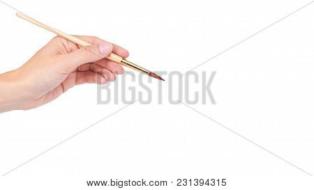 Paint Brush In Hand Isolated On White Background. Copy Space, Template.