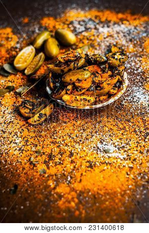 Popular Indian Squash Pickle Or Tinda Nu Athnu Or Achar In A Glass Plat With All Its Ingredients And