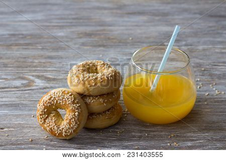 Traditional Greek Easter Biscuits Paskhalina Kuluria With Sesame Seeds On A Wooden Table, Selective 
