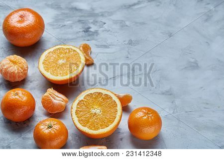 Variety Of Fresh Citrus For Making Juice Or Smoothie Over Light Textured Background, Topview, Select