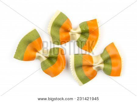 Farfalle Pasta With Green Spinach And Orange Carrot Isolated On White Background Top View Three Raw 